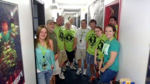 Gathering in the hallway near the Square Donuts table!